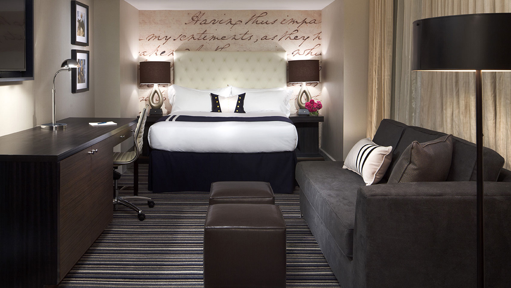 Guestroom with 1 king bed, sofa bed, and desk at Kimpton Hotel George