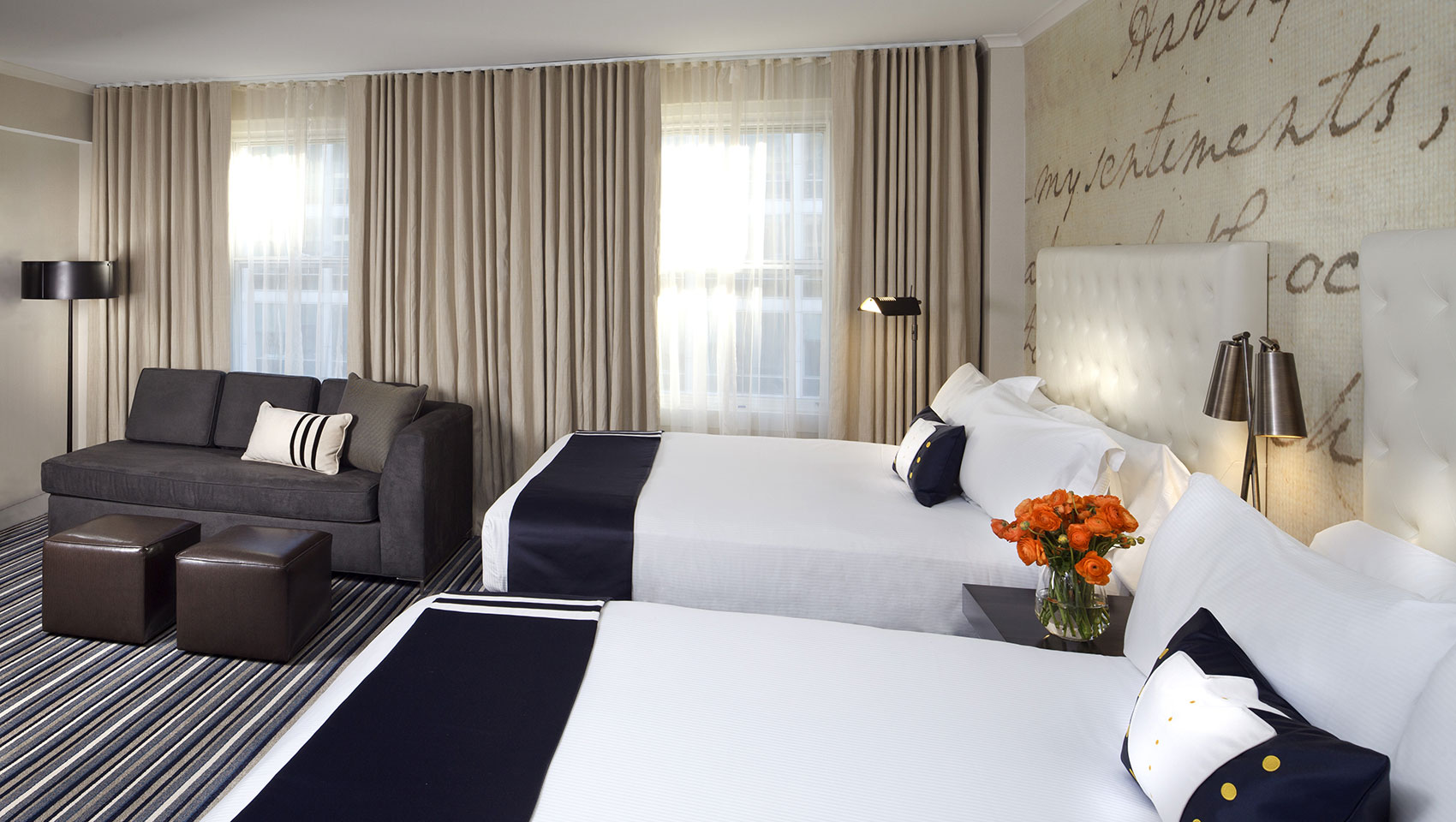 Guestroom with 2 queen beds and sofa bed at Kimpton Hotel George